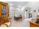Cozy dining room with natural light and a view of the home's entrance at 4540 Park Ave, Indian Lake Estates, FL 33855