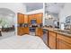 Beautiful kitchen with stainless steel appliances, and view of breakfast nook at 4540 Park Ave, Indian Lake Estates, FL 33855