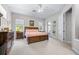 Bright main bedroom with walk-out access and natural light at 4540 Park Ave, Indian Lake Estates, FL 33855