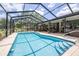 Inviting screened-in pool area with ample patio space for entertaining at 4540 Park Ave, Indian Lake Estates, FL 33855