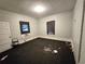 A basic bedroom with natural light, showing the need for thorough cleaning and possible renovation at 4885 Cherry Dr, Mulberry, FL 33860
