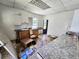 Kitchen featuring cabinets and countertops; renovation needed for updated look at 4885 Cherry Dr, Mulberry, FL 33860