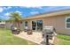 Great backyard with patio, grill and furniture at 4965 Tradition Dr, Lakeland, FL 33812