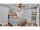 A well-lit bedroom with natural light and a ceiling fan at 4965 Tradition Dr, Lakeland, FL 33812