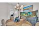 Dining room featuring a wooden table with seating and a large aquarium, adding a touch of nature and elegance at 4965 Tradition Dr, Lakeland, FL 33812