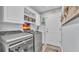 A practical laundry room features modern appliances and ample storage space at 4965 Tradition Dr, Lakeland, FL 33812