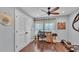 Bright office space with wood floors, neutral walls, and large windows, perfect for productivity and focus at 4965 Tradition Dr, Lakeland, FL 33812