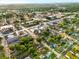 A neighborhood aerial view pinpoints the property's location amidst trees and nearby city amenities at 522 Channing Rd, Lakeland, FL 33805