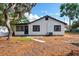 Home exterior featuring a well-kept lawn at 522 Channing Rd, Lakeland, FL 33805