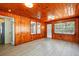 Cozy room with hardwood flooring and natural light from multiple windows at 522 Channing Rd, Lakeland, FL 33805