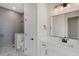 Modern bathroom featuring a walk-in shower, vanity, and sleek fixtures at 5390 Clubhouse Hills Ln, Lakeland, FL 33812