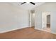 Spacious bedroom with hardwood floors and ensuite bathroom access at 5390 Clubhouse Hills Ln, Lakeland, FL 33812