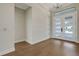Bright entryway featuring hardwood floors, neutral paint and an abundance of natural light from front door at 5390 Clubhouse Hills Ln, Lakeland, FL 33812