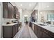 Stylish kitchen boasting stainless steel appliances, modern cabinets, and a view to dining area at 5531 Pebble Beach Dr, Lakeland, FL 33812