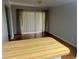 Bright dining area with hardwood floors and sliding door access to outdoor living space at 602 Avery Ln # 602, Lakeland, FL 33803