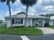 Inviting single-story home with well-kept lawn and tropical foliage for added curb appeal at 602 Avery Ln # 602, Lakeland, FL 33803