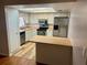 Functional kitchen features stainless steel appliances, wood countertops and a breakfast bar at 602 Avery Ln # 602, Lakeland, FL 33803