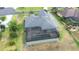 Overhead view of a home with a screened-in pool at 6347 Ashley Dr, Lakeland, FL 33813