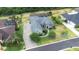 Aerial view of home, showcasing landscaping and screened-in pool at 6347 Ashley Dr, Lakeland, FL 33813