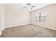 Bedroom with a ceiling fan features a window with natural light at 6347 Ashley Dr, Lakeland, FL 33813