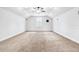 Large bedroom with vaulted ceiling features a ceiling fan and window at 6347 Ashley Dr, Lakeland, FL 33813