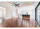 Spacious living area featuring hardwood floors, recessed lighting, and an open layout to the kitchen and backyard at 6347 Ashley Dr, Lakeland, FL 33813
