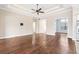 Open-concept living area featuring hardwood floors, recessed lighting, and passage ways to other rooms at 6347 Ashley Dr, Lakeland, FL 33813
