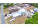 This home features a metal roof, spacious backyard with white fencing, and is located near the street at 640 Waldon N Ave, Bartow, FL 33830