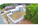 Aerial view of property showcasing the home, large fenced backyard, mature trees and neighborhood at 640 Waldon N Ave, Bartow, FL 33830