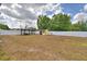 Large backyard featuring a shed, privacy fence, and a gazebo with table and chairs at 640 Waldon N Ave, Bartow, FL 33830