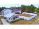 This backyard is enclosed with white fencing and contains a gazebo and shed at 640 Waldon N Ave, Bartow, FL 33830