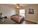Cozy bedroom featuring a ceiling fan and natural light at 640 Waldon N Ave, Bartow, FL 33830
