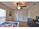 Bedroom with natural light and closet doors and a dresser at 640 Waldon N Ave, Bartow, FL 33830