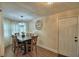 This dining room features a stylish light fixture and a dark wood table for six at 640 Waldon N Ave, Bartow, FL 33830