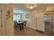 The dining room features a wooden table for six and stainless steel refrigerator at 640 Waldon N Ave, Bartow, FL 33830