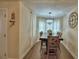 Light-filled dining room featuring a table for six with modern lighting fixture and neutral paint at 640 Waldon N Ave, Bartow, FL 33830