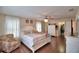 Bright main bedroom with wood floors, ceiling fan and walk-in closet at 640 Waldon N Ave, Bartow, FL 33830