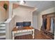 Home office area with desk, stairs, and convenient hall tree at 640 Waldon N Ave, Bartow, FL 33830