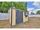 Durable shed with window and dark trim at 640 Waldon N Ave, Bartow, FL 33830