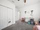 Bedroom featuring a closet, doorway to other rooms, and playroom decor at 6520 Great Bear Dr, Lakeland, FL 33805