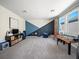 Spacious game room with painted walls, windows, and recreational equipment at 6520 Great Bear Dr, Lakeland, FL 33805