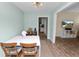 Charming dining area with view of the living room at 705 W Park St, Lakeland, FL 33803