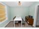 Inviting dining area with modern table, bench and shelving unit at 705 W Park St, Lakeland, FL 33803