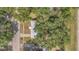Birds eye view of home with mature trees, and well manicured landscape at 7208 Thomas Jefferson Cir, Bartow, FL 33830