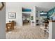 Bright and airy living room with wood-look floors and open floor plan with natural light at 781 Bryson Loop, Lakeland, FL 33809