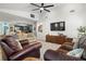 Open-concept living space showcases the kitchen, creating a warm and inviting atmosphere at 781 Bryson Loop, Lakeland, FL 33809