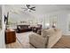 Spacious living room with high ceilings, large windows, and comfortable seating area at 781 Bryson Loop, Lakeland, FL 33809
