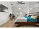 Main bedroom features a private patio, and a bright, neutral color scheme at 781 Bryson Loop, Lakeland, FL 33809