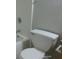 The bathroom features a white toilet and shower/bath combination at 7952 Grand Pines Blvd, Lakeland, FL 33810