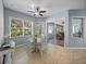 Cozy breakfast nook with tile flooring, ceiling fan, and views of the backyard at 800 Osprey Landing Dr, Lakeland, FL 33813